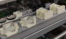 Ricoh使用用定制的Stratasys的3D打印定制轻量级的夹具替代金属工具