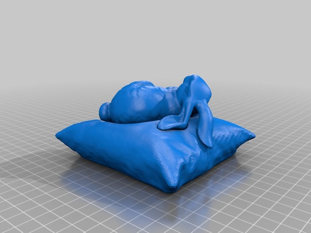 qqStanford_bunny_resting_on_a_pillow__bunny_and_pillow_.stl